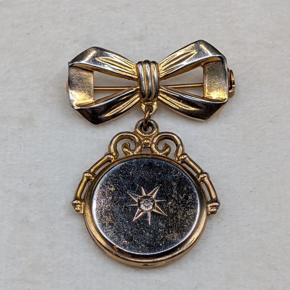 Vintage Coro Bow Brooch with Starburst Medallion – 1940s